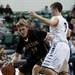 Dexter High School junior Derek Seidl pushes toward the rim against a Saline defender on Friday, Jan. 4. Daniel Brenner I AnnArbor.com